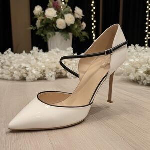 Breathtaking Cream Colored Stiletto with Black Trim